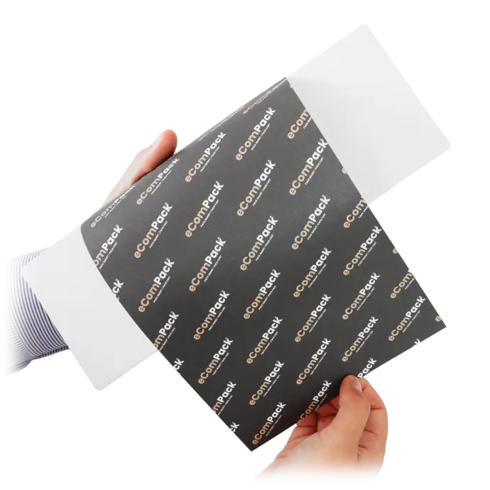 Hands wrapping the eComPack retention paper around an online order